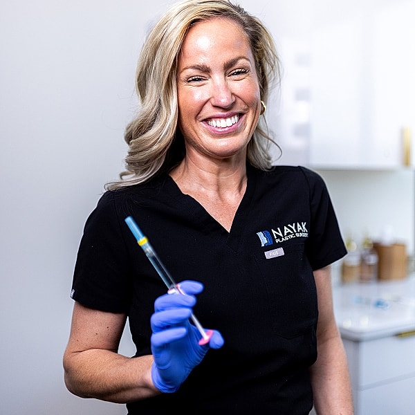 St. Louis Medical Spa performing treatment in a clinical setting.