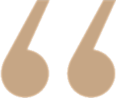 Stylized quotation marks in beige color.