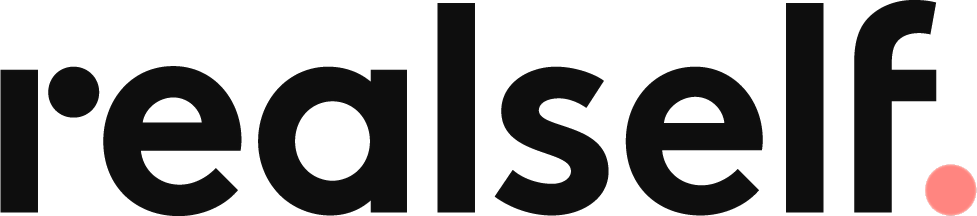 RealSelf logo in modern typography design.