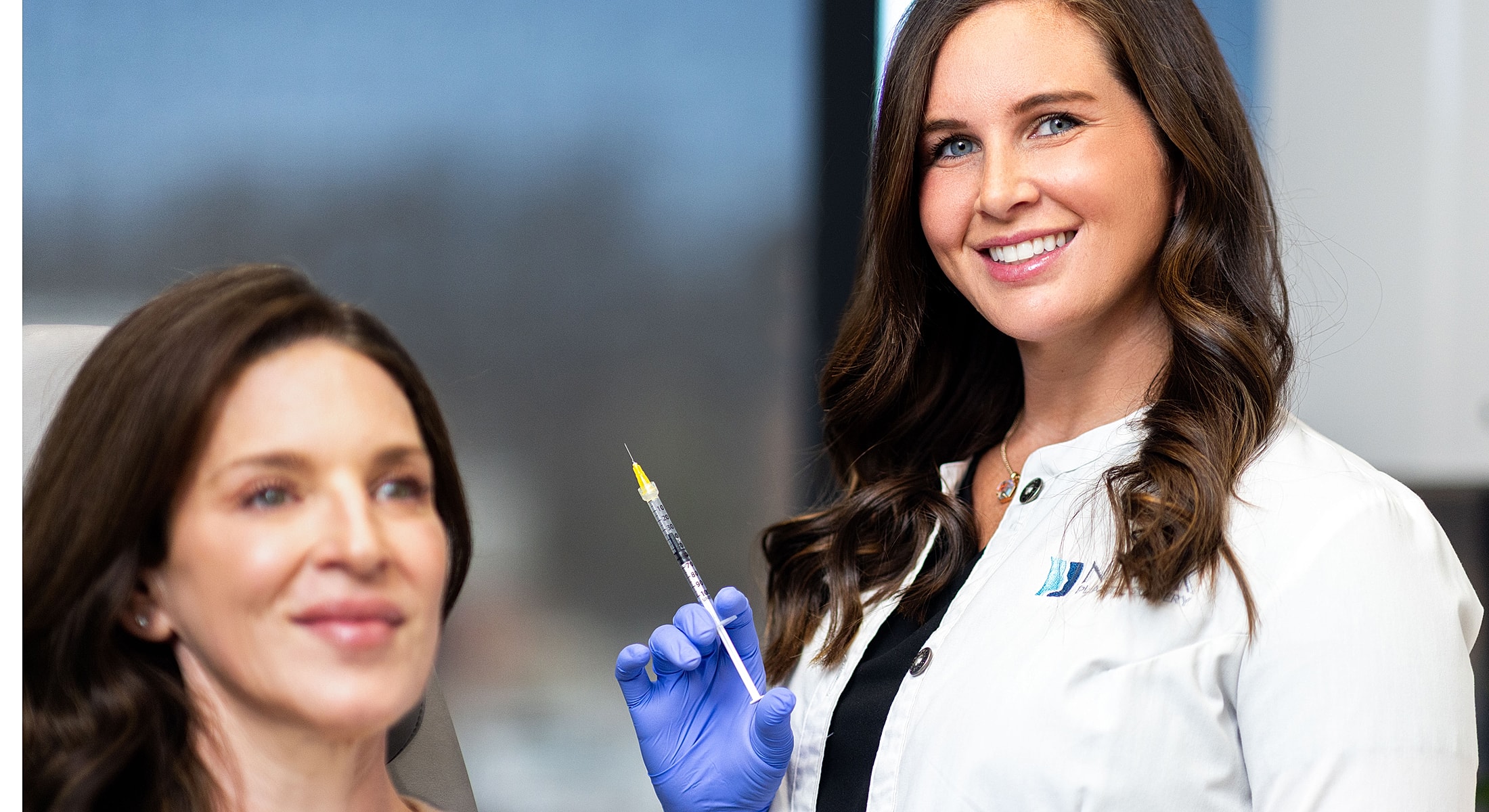 Healthcare professional preparing for a cosmetic procedure.